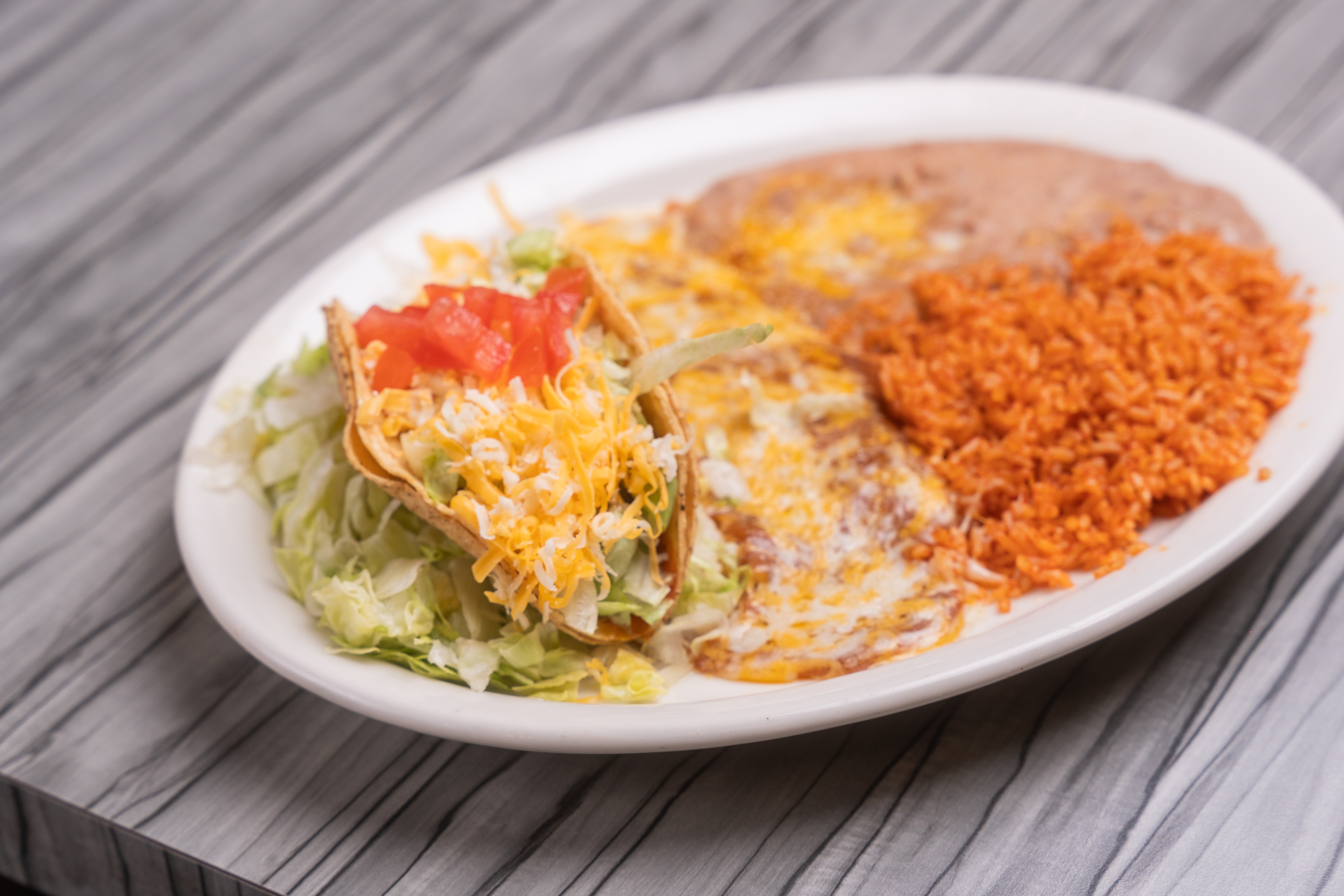 #1 Cheese enchilada, taco